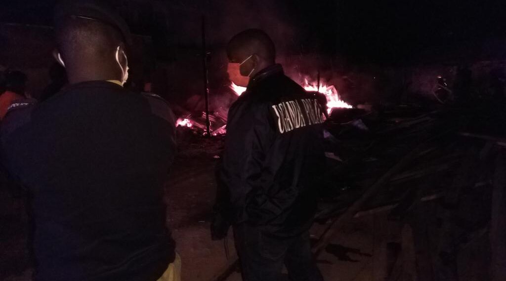 Courtesy photo of fire fighters and police at the scene. Photo by Andrew Agaba
