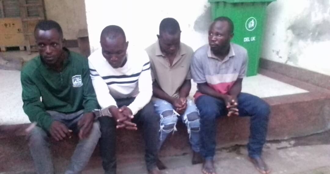The suspected fraudsters at Kisoro Police headquarters