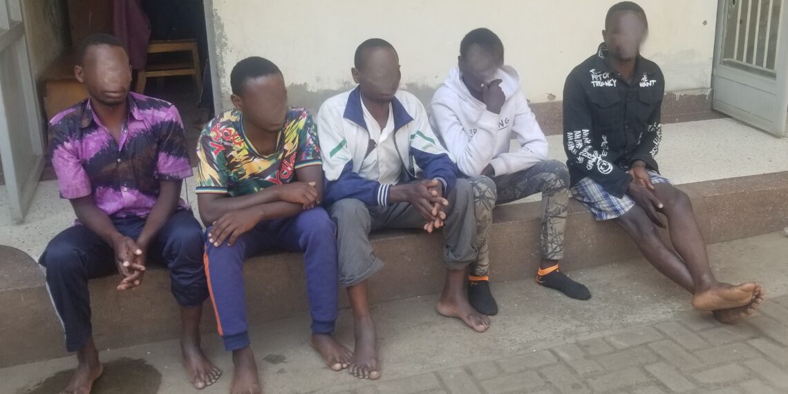 Some of the suspects at Kisoro Central Police Station on Monday, June 30, 2025. [PHOTO by Derrick Akampurira]