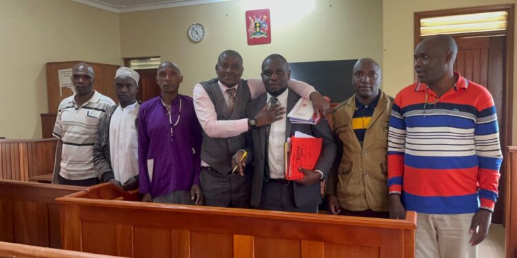 Defense Counsel Nabaasa Rodgers with the acquitted following the judgment