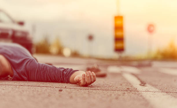 Traffic accident.Young man hit by a car